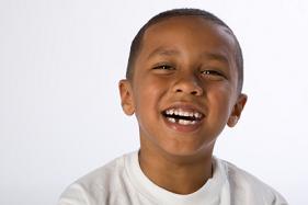 Smiling boy with missing tooth, at Glenview, IL.